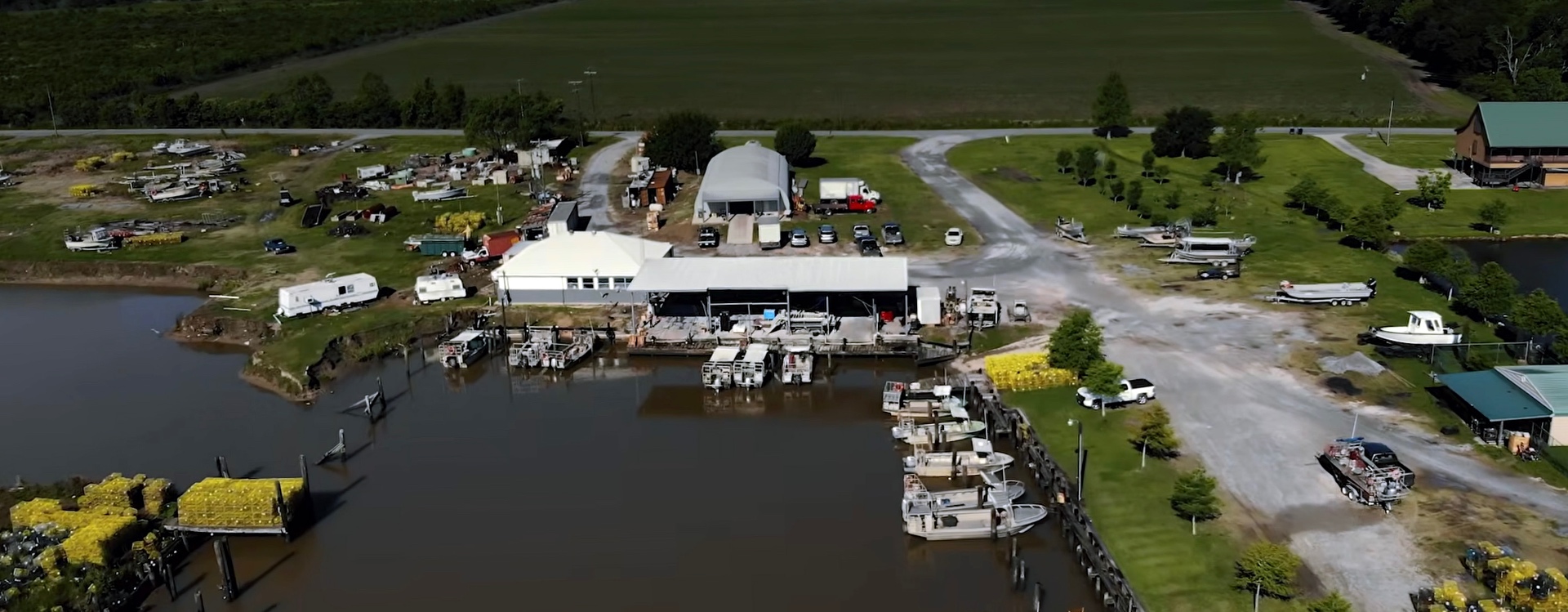 Aerial view of the St. Mary Seafood & Marina dock, boats, and the Intracoastal waterway